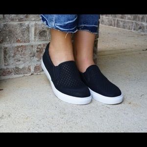 Black slip on sneakers